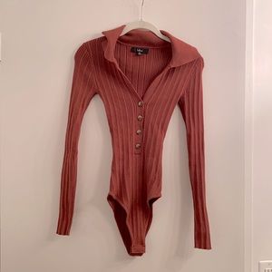 Ribbed button-up long sleeve bodysuit